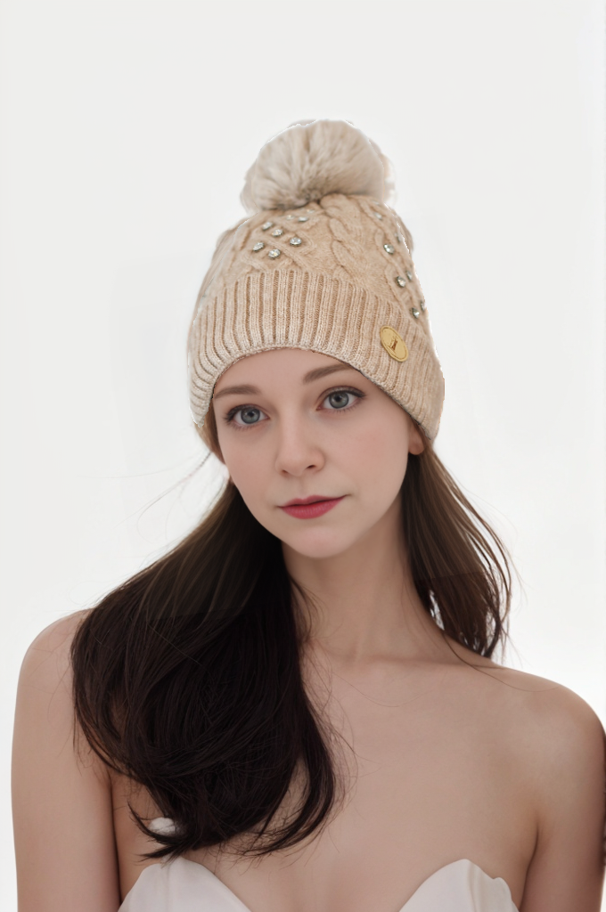 Woman's knitted bedazzled pom pom hat