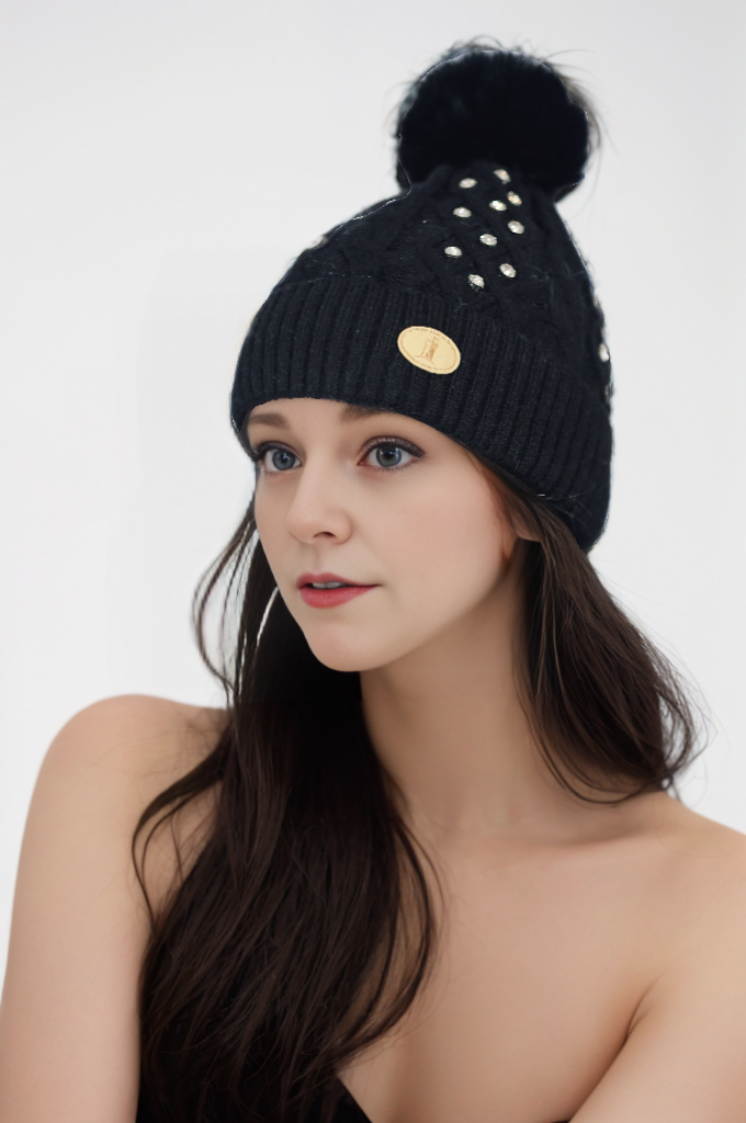 Woman's knitted bedazzled pom pom hat